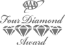A small white jagged mark resembling an arrow or symbol on a gray background.